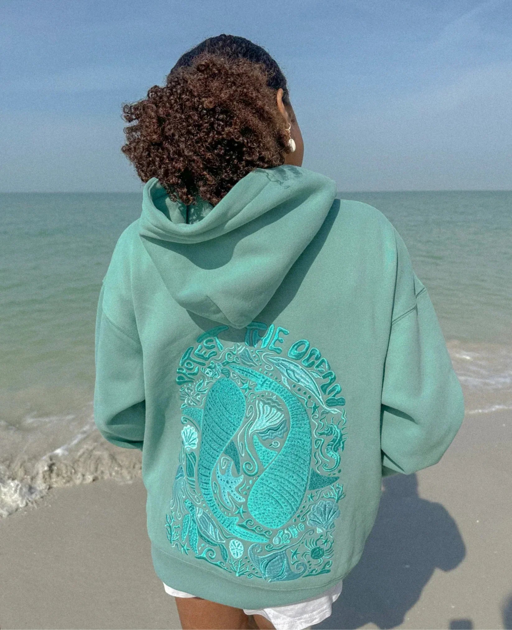 Whispering Tides Kapuzenpullover